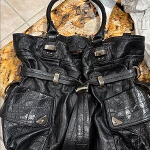 Black embossed leather satchel bag